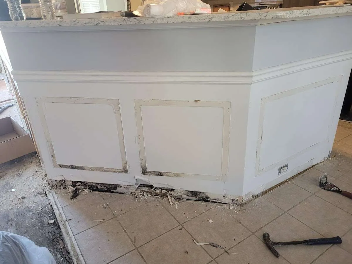 Water damage and mold on kitchen during Storm Damage Restoration in Bacliff